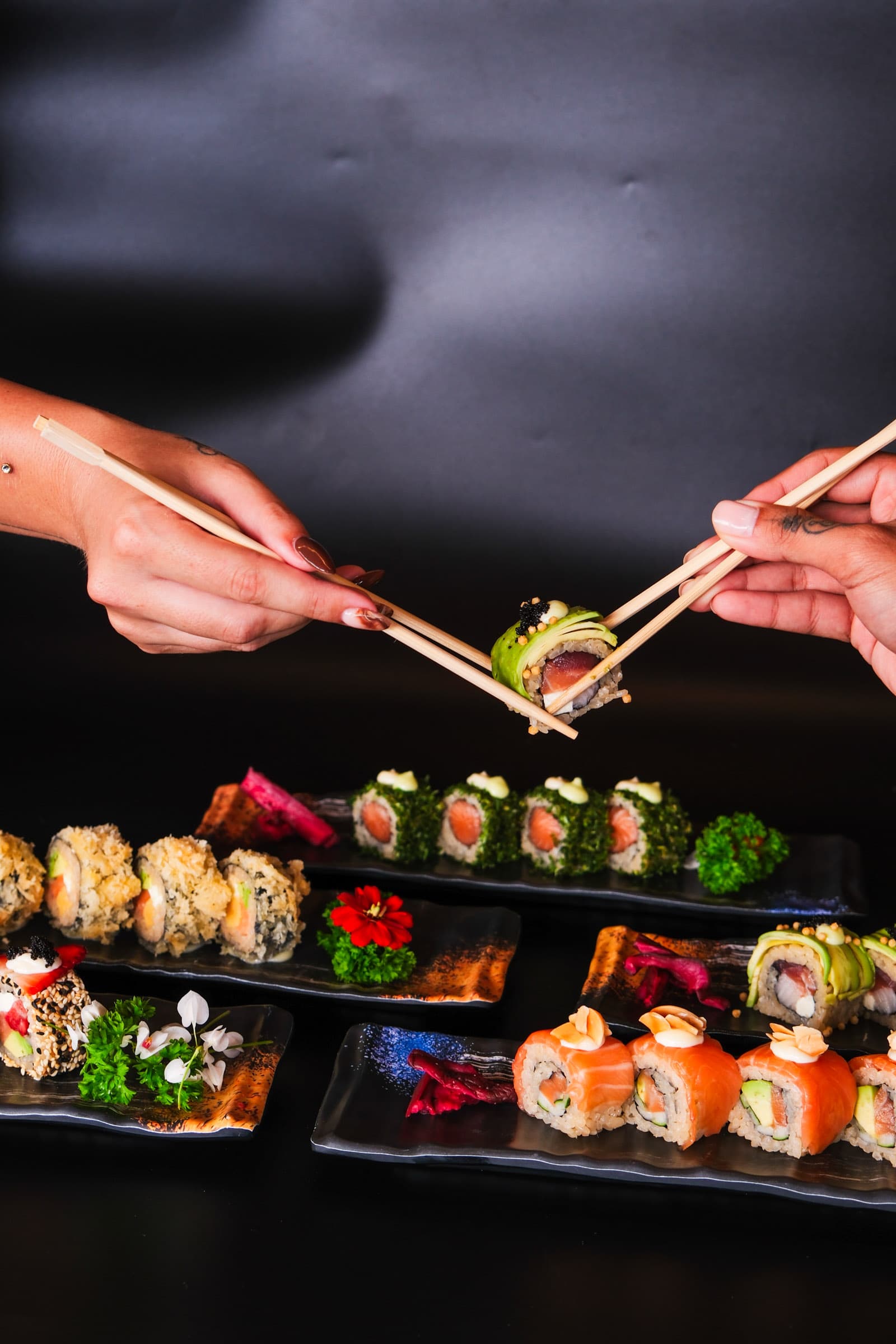 Colorful spread of sushi rolls perfect for sharing