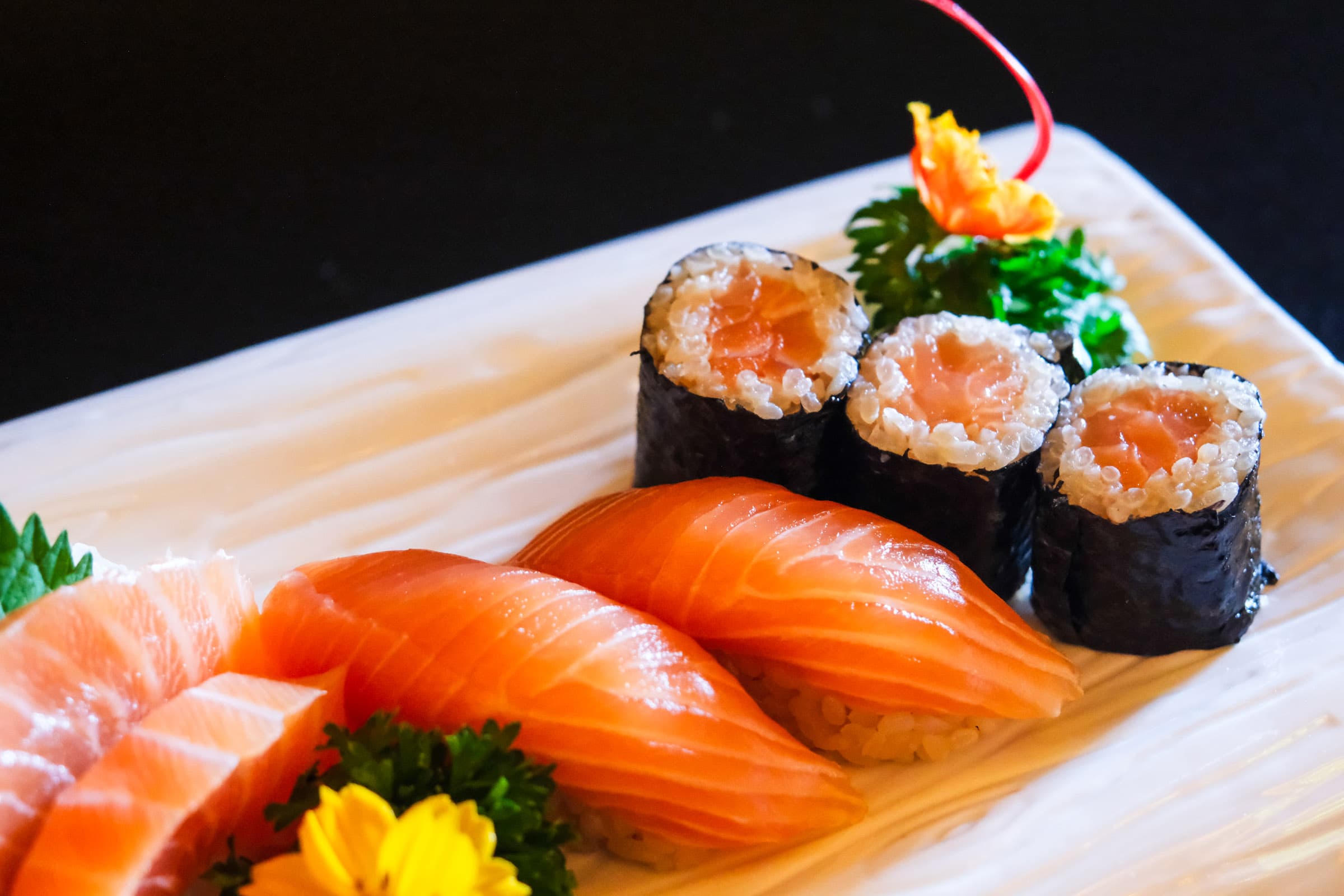 Fresh salmon nigiri and maki rolls